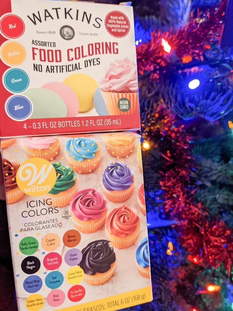 Vegan food coloring boxes that include Watkins and Wilton