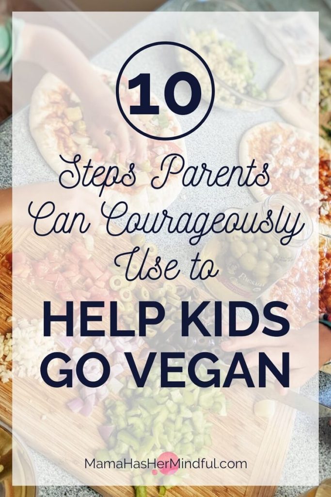 Pin for Pinterest that reads 10 Steps Parents Can Courageously Use to Help Kids Go Vegan and has a photo in the background of two kids arranging plant-based toppings on homemade pizzas in their kitchen.