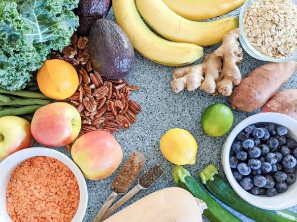 Plant-based foods for anyone starting a vegan diet that include: lentils, apples, green beans, kale, nuts, flaxseed, chia seeds, butternut squash, zucchini, blueberries, lemons, limes, sweet potatoes, ginger, oats, bananas, and avocados.