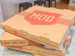 Boxes of vegan pizzas from MOD Pizza