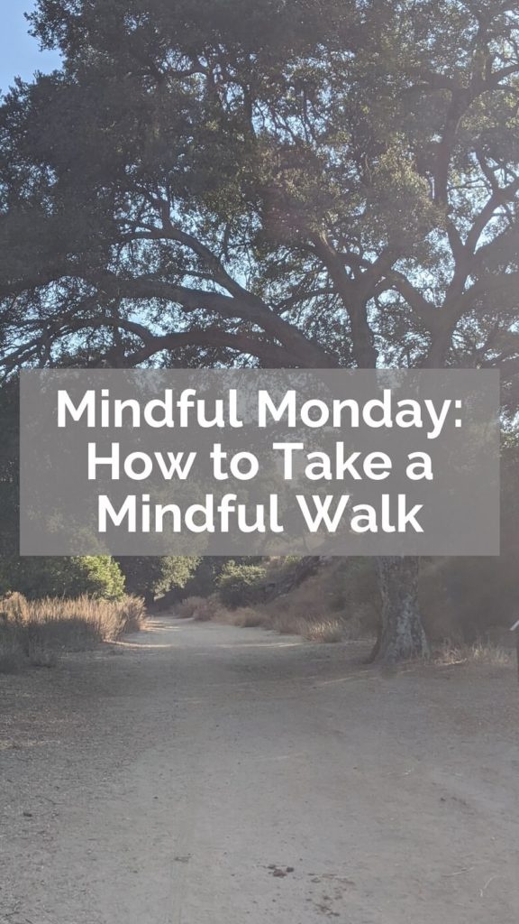 A photo of a path alongside trees and bushes with a large oak tree to the right and the words Mindful Monday: How to Take a Mindful Walk
