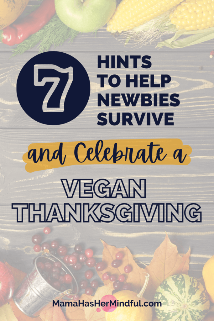 Fall fruits and vegetables on a dark wood table with text over the image that reads 7 Hints to Help Newbies Survive and Celebrate a Vegan Thanksgiving