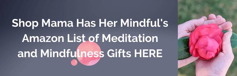 A graphic that reads: Shop Mama Has Her Mindful's Amazon List of Meditaiton and Mindfulness Gifts HERE. There is a photo of a child's hands holding a pink flower with two leaves.