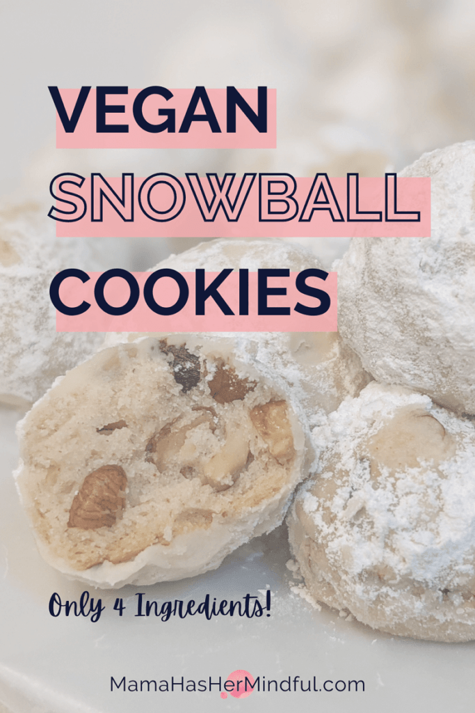 A photo of vegan snowball cookies or Mexican wedding cookies with a bite out of one and the words over the image read: Vegan Snowball Cookies - Only 4 Ingredients! and the URL Mama Has Her Mindful dot com.